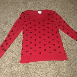 Red sweater with black polka dots